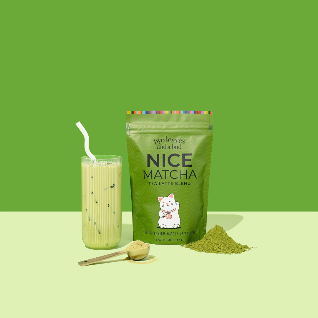 iced matcha latte in a glass with ice and Two Leaves matcha
